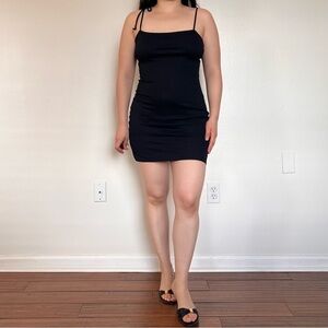 UO Urban Outfitters Black Ribbed Bodycon Mini Dress with slit. Size: M